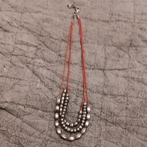 Silver Beaded Necklace with Red Cord